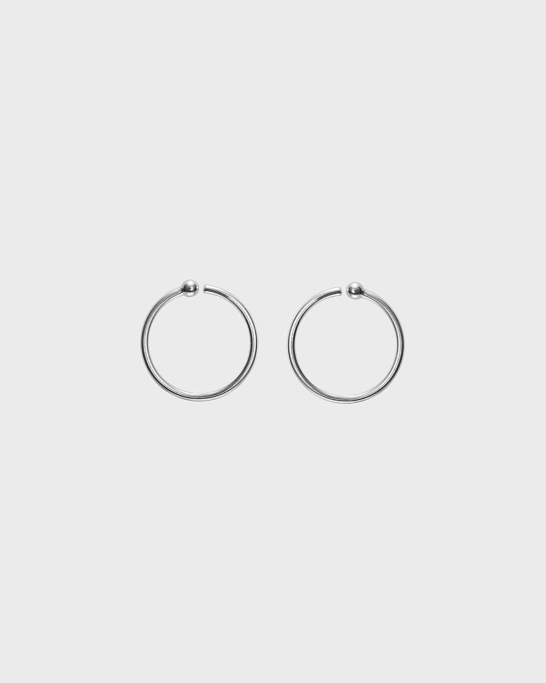 Amulet earrings silver half pair left