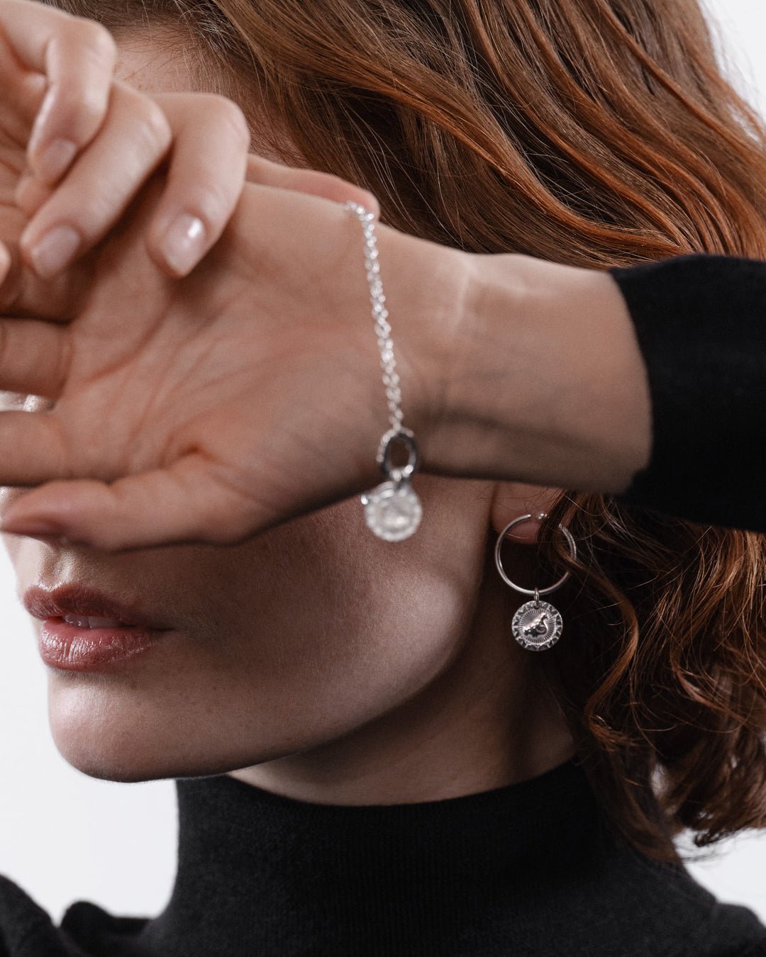 Amulet earrings silver half pair left