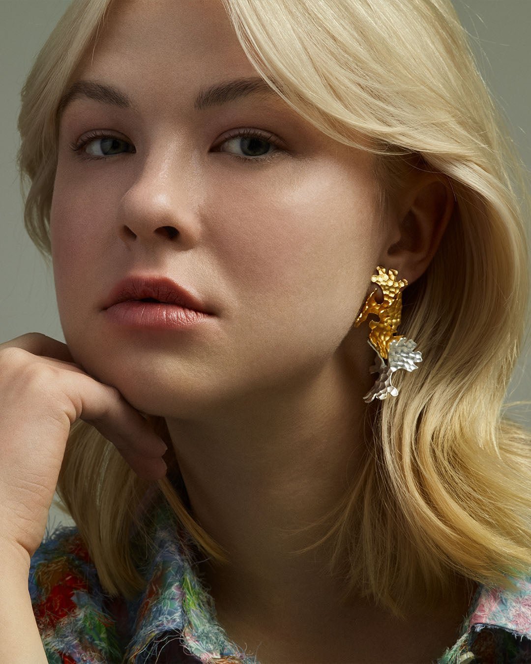 Tundra-korvakorun lisäosa pronssi