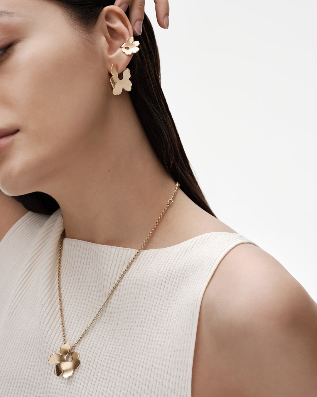 Unikko スモールピアス ブロンズ ハーフ（左）