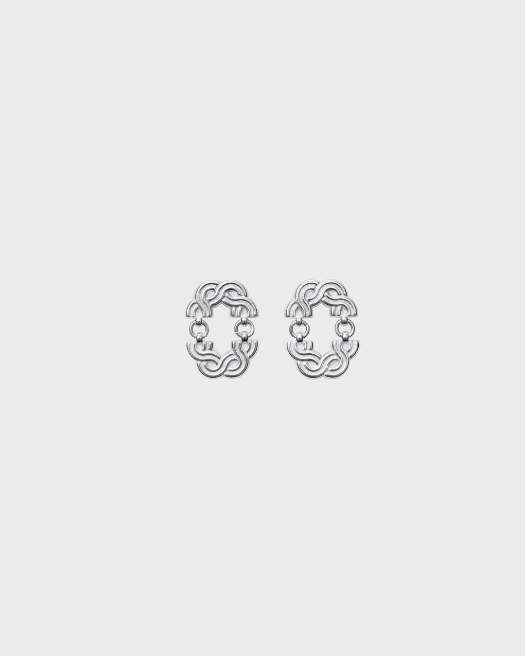 Louhetar earrings small silver half pair left