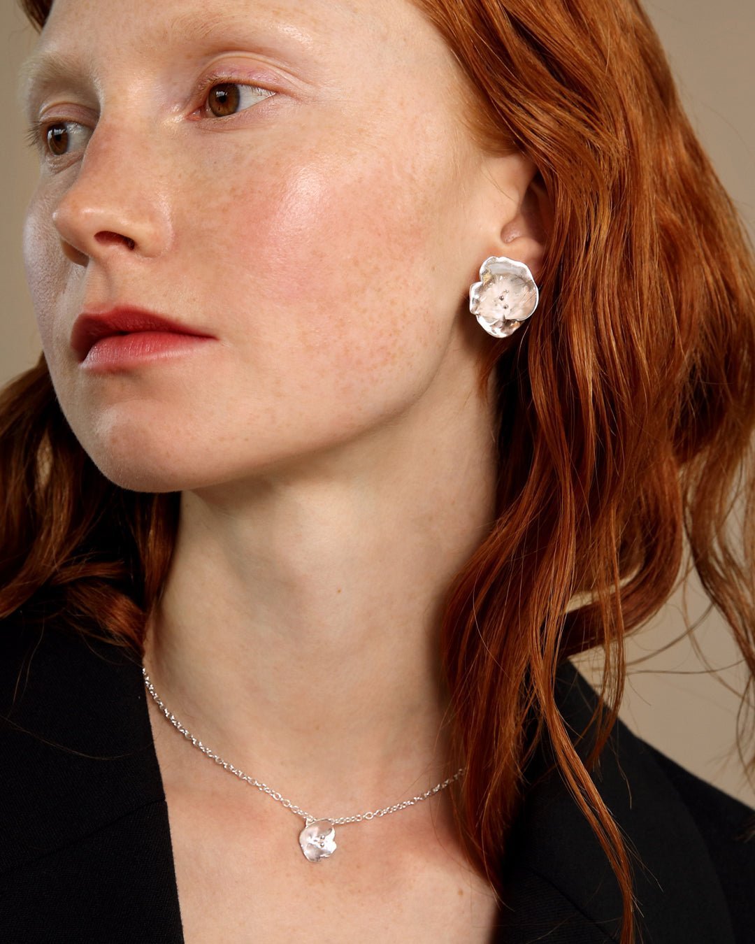 Summer night rose earrings medium size silver half pair left
