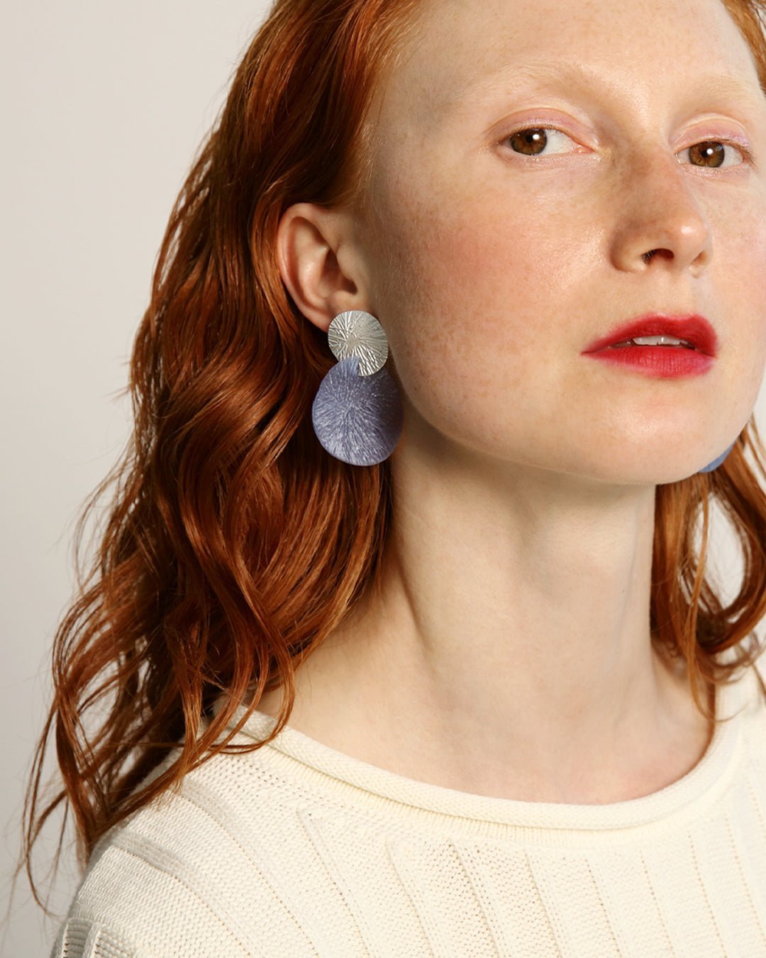 Nolla earrings silver blue half pair right